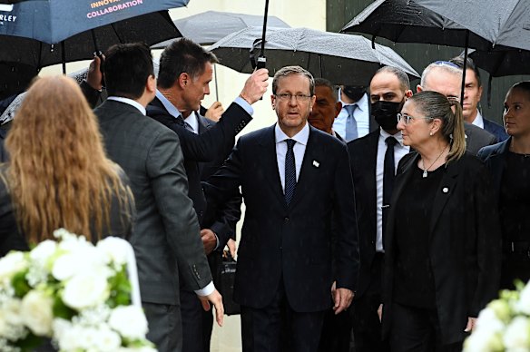 NSW Premier Chris Minns greets Israeli President Isaac Herzog and wife Michal Herzog in Sydney earlier on Monday during a visit to Bondi.