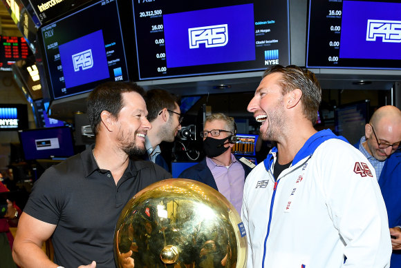 Mark Wahlberg and F45 co-founder Adam Gilchrist at the New York Stock Exchange in July last year.