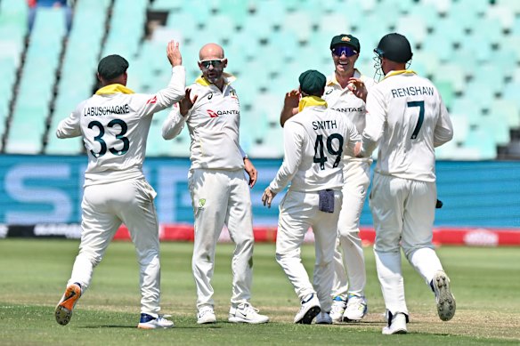 Australia celebrate the wicket of Temba Bavuma.
