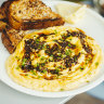 Scrambled eggs with black lime za’atar crisp, sourdough and cultured butter.
