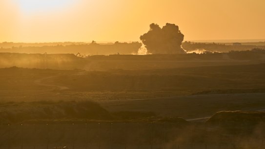 An Israeli army vehicle moves along the Gaza border in southern Israel on Sunday.