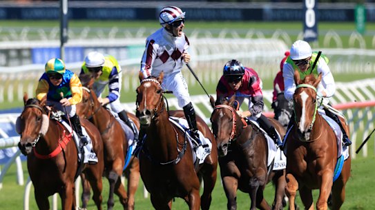Tommy Berry celebrates aboard Art Cadeau at Randwick on Saturday.
