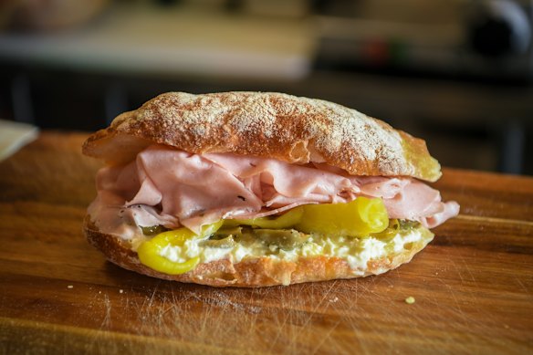 The Bologna with mortadella, stracciatella, pickled peppers and olives.