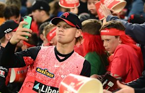 Fraser-McGurk takes a selfie with a fan.