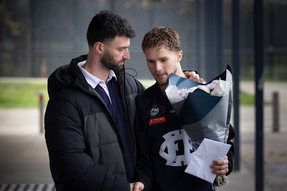 Epping Football Netball Club president Luke De Vincentis (left) with Matthew Fitzgerald, brother of Nathan Fitzgerald...