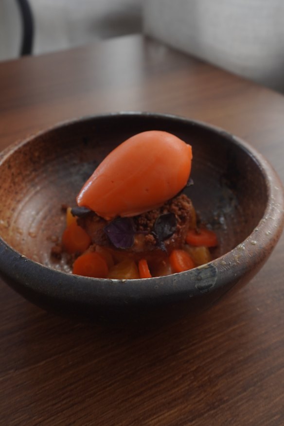 Carrot sorbet with ginger, almond, mandarin and shiso.