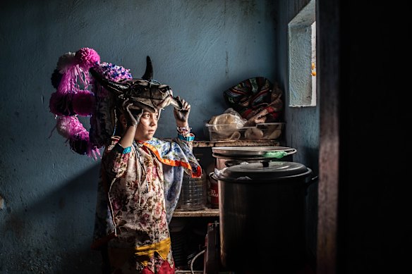 Portrait of a local woman during the Women’s Afro-Mexican Carnival of Alto Tio Diego on February 15, 2026 in Alto Tio Diego, Mexico. Alto Tio Diego is a small town near the State capital Xalapa where every year inhabitants celebrate their traditional carnival. Women of the town demanded a special day for them to parade and few years ago, they started to do it by walking through the streets wearing traditional costumes and masks (mostly of animals) but the attires have evolved to more modern characters. 