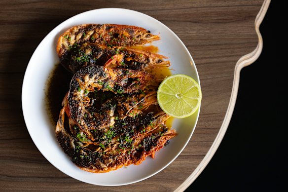 Skull Island prawns with black pepper butter, lime and chives.
