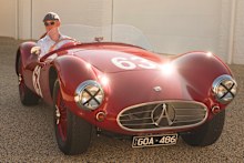 Simon Purcell at home in his prized car. “I buy them because I like them. I’m not trying to just accumulate or make a profit.”