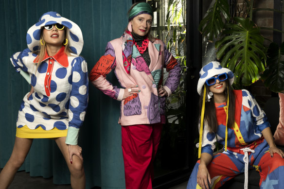 Fashion Designer Monika Branagan (centre) with models Shanesse Wong and Tori Michael. Designers who are are braving tough retail conditions by launching labels. They are hoping that bold style signatures will buck the trend. Sydney.
