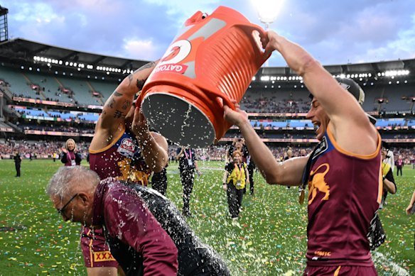 Lions coach Chris Fagan is doused in sports drink.