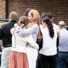 Mourners attended the funeral of Bejamin and Russell Smith on Wednesday in Springwood.