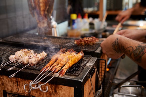 Octopus and prawns are cooked over the hibachi at Pearler &amp; Co.