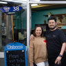 Soi 38 restaurant’s owners Tasha Piyaphanee and Top Piyaphanee outside the restaurant in a carpark.