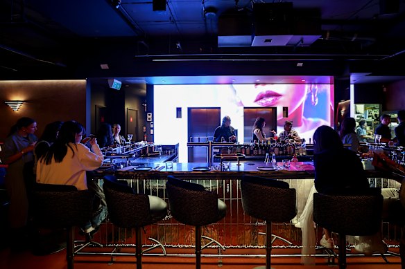 Projections behind the bar.