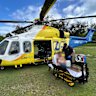 A man has been flown to hospital after being bitten by a shark while snorkelling.