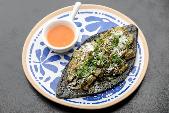 Huarache topped with nopales.