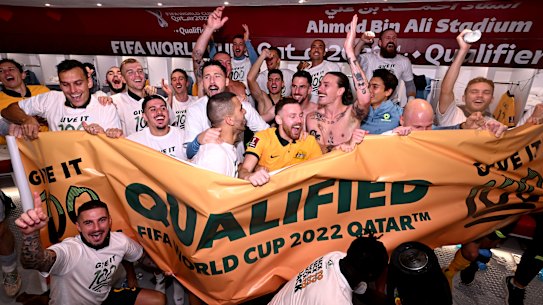 The jubilant scenes in the Socceroos’ dressing room.