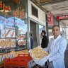 Romal Saleh-Zada with naan from the Maiwand Bakery.
