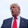 “Obviously, it’s no time to be talking about pardons,” Donald Trump said after landing in Scotland.