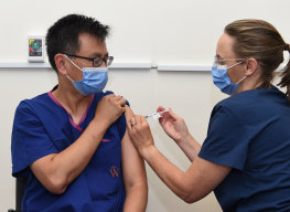 Professor Allen Cheng received the Pfizer vaccine at The Alfred hospital in March.