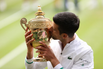 Novak Djokovic celebrates last year’s championship at Wimbledon; his record equalling 20th grand slam singles title. 