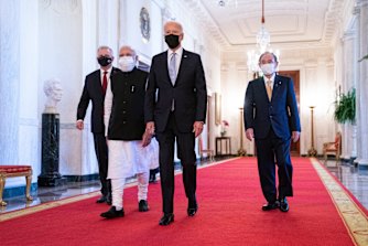 Quad summit: US President Joe Biden in the White House with, from left, Scott Morrison, Indian Prime Minister Narendra Modi and former Japanese Prime Minister Yoshihide Suga. 