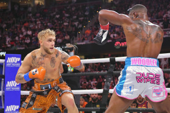 Jake Paul shapes up Tyron Woodley in their last fight on August 29. The rematch is coming up on December 18.