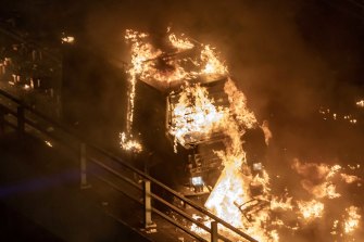 A police vehicle on fire near Hong Kong Polytechnic University on Sunday evening.