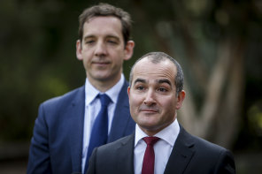 Steve Dimopoulos (background), seen here with outgoing Deputy Premier James Merlino, entered parliament in 2014.