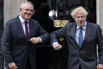 Prime Minister Scott Morrison is greeted by British PM Boris Johnson outside 10 Downing Street, London, on Monday.