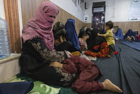 Displaced Afghan women and children shelter in a mosque in Kabul on August 13.