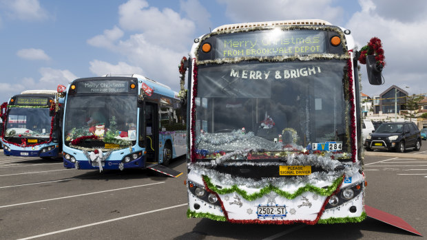 Sydney's buses line up for the  Christmas decoration competition. Commuters are advised to plan ahead for Christmas and New Year public transport. 