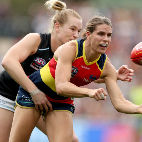 Breann Moody tackles Chelsea Randall of the Crows during the 2019 AFLW Grand Final match between the Adelaide Crows and the Carlton Blues.