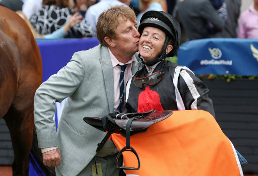 Mick Bell with Jade Darose after the win of Jungle Edge in the John Monash Stakes.