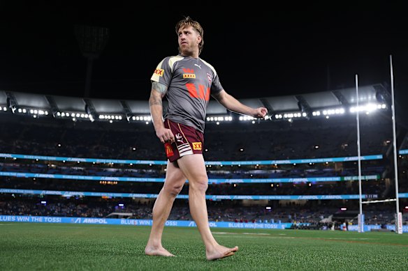 O capitão dos Maroons, Cameron Munster, está no território do MCG à frente do Estado de Origem.