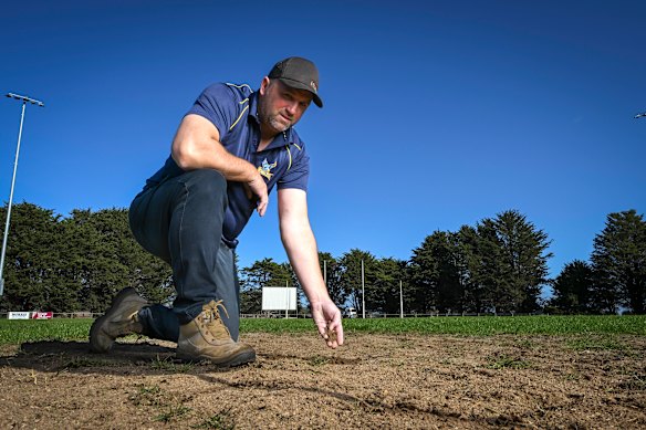 Western Eagles senior coach Dan Casey at his drought-stricken ground. 