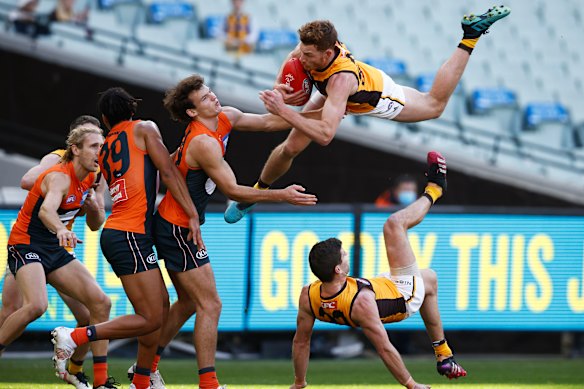 Tim O’Brien takes a ‘Superman’ grab for the ages in Hawthorn’s win over the Giants.