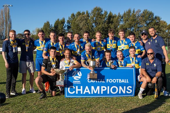 Yoogali SC celebrates their 2023 championship in the Capital Premier League, which secured promotion to the NPL.