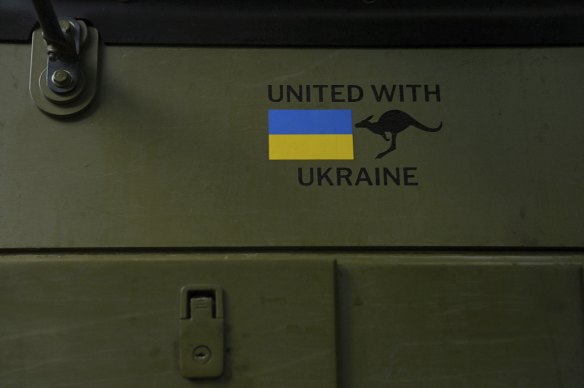 A kangaroo mascot alongside the Ukrainian flag on the side of a Bushmaster. Australia has sent 60 of the armoured vehicles to the war-ravaged country.