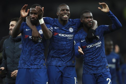 Left to right: Antonio Rudiger, Kurt Zouma and Fikayo Tomori celebrate Chelsea's 2-0 win over Spurs.