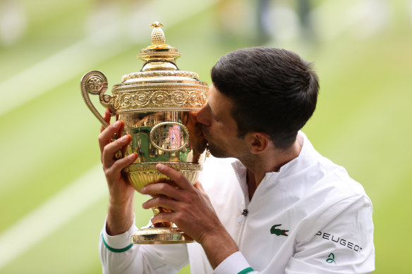 Novak Djokovic celebrates last year’s championship at Wimbledon; his record equalling 20th grand slam singles title. 