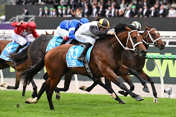 Damian Lane riding The Roaring Sun winning race 1, the Channel 9 Carbine Club Stakes during Derby Day at Flemington.
