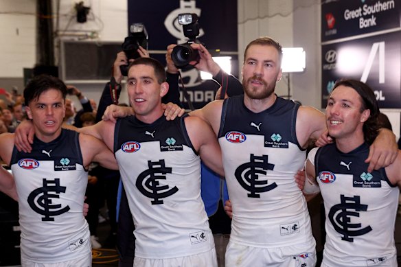 Elijah Hollands, Jacob Weitering, Harry McKay and Oliver Hollands of the Blues after defeating the Saints.