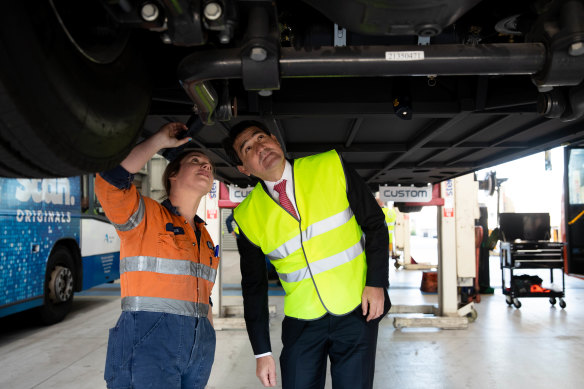 Volvo Bus apprentice, Renee Gibson with Tertiary Education Minister, Geoff Lee who has announced new skills training for mechanics working on electric vehicles.

