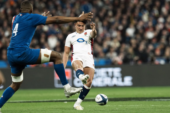 England’s Marcus Smith puts through a grubber kick against France.