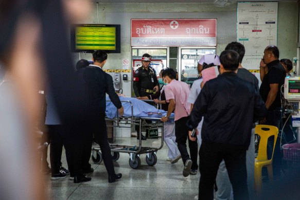 Victims of the Terminal 21 mall shooting are treated at Maharat Nakhon Ratchasima Hospital on Sunday.