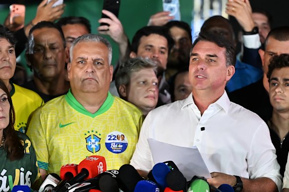 Flavio Bolsonaro (right). 
