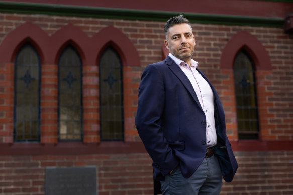 Silas Issa outside Baptist Union church in Essendon, where his congragation met for a time when he was senior pastor.