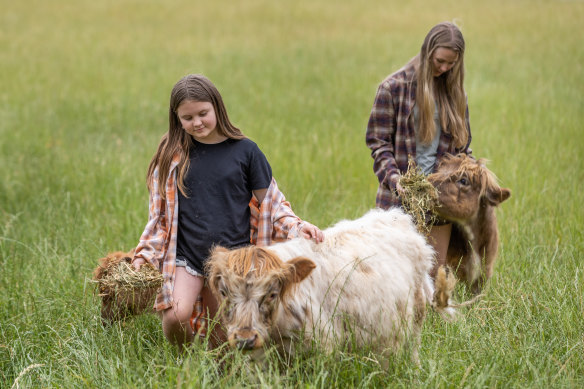 Charlotte, 11, and Jasmine, 17, with their paddock pets.